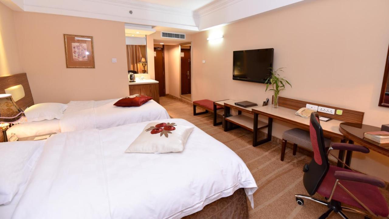 Bremen Holiday Hotel Харбин Екстериор снимка